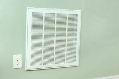 Air vent with dust on it inside a home