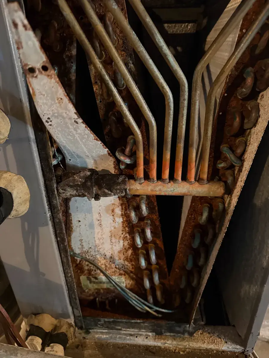 Another view of the corroded evaporator coil above the furnace in Shrewsbury, PA