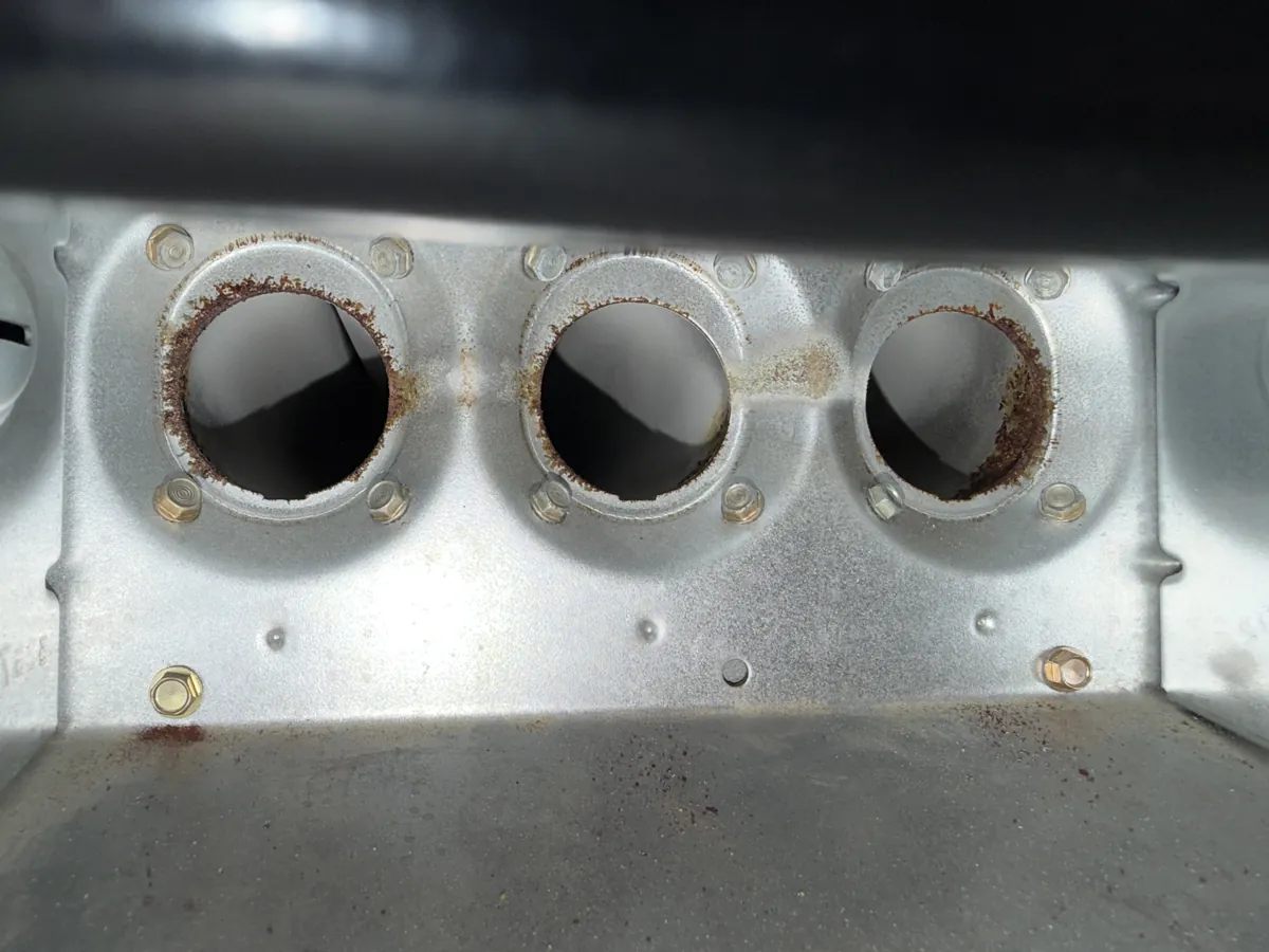 Rust around the heat exchanger openings inside a gas furnace in Shrewsbury, PA
