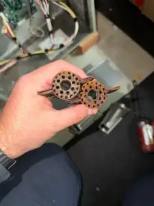 Rusted burners pulled from a Trane furnace during a no-heat repair in York, PA